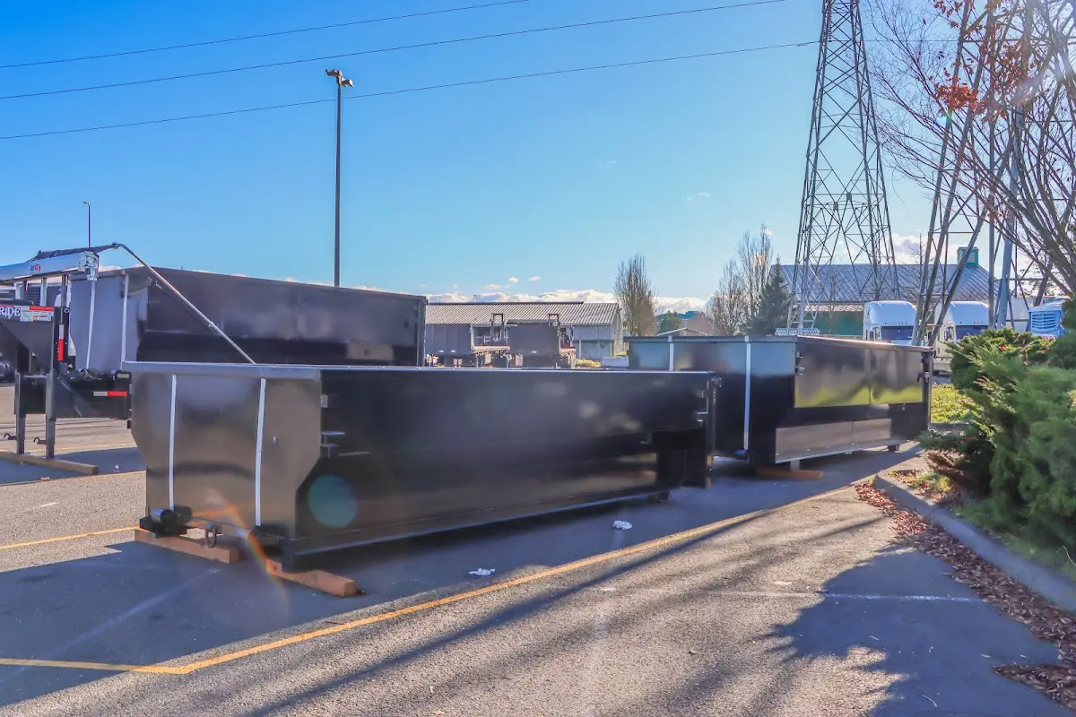 Roll-off dumpster ready for waste disposal at job site for 15 Yard Dumpster Rental in Lockhart